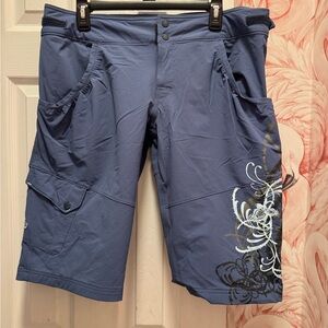 The North Face Blue Cargo Shorts with Floral Pattern
